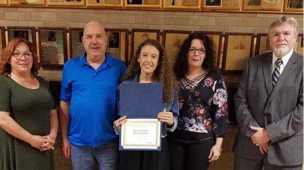 Pictured from left:  Kelley O'Brien Gavin (BIDA Exec. Dir.), Grant Lalli (Father), Sarah Lalli, Theresa Lalli (Mother), Dan McGann (BIDA Board Member)