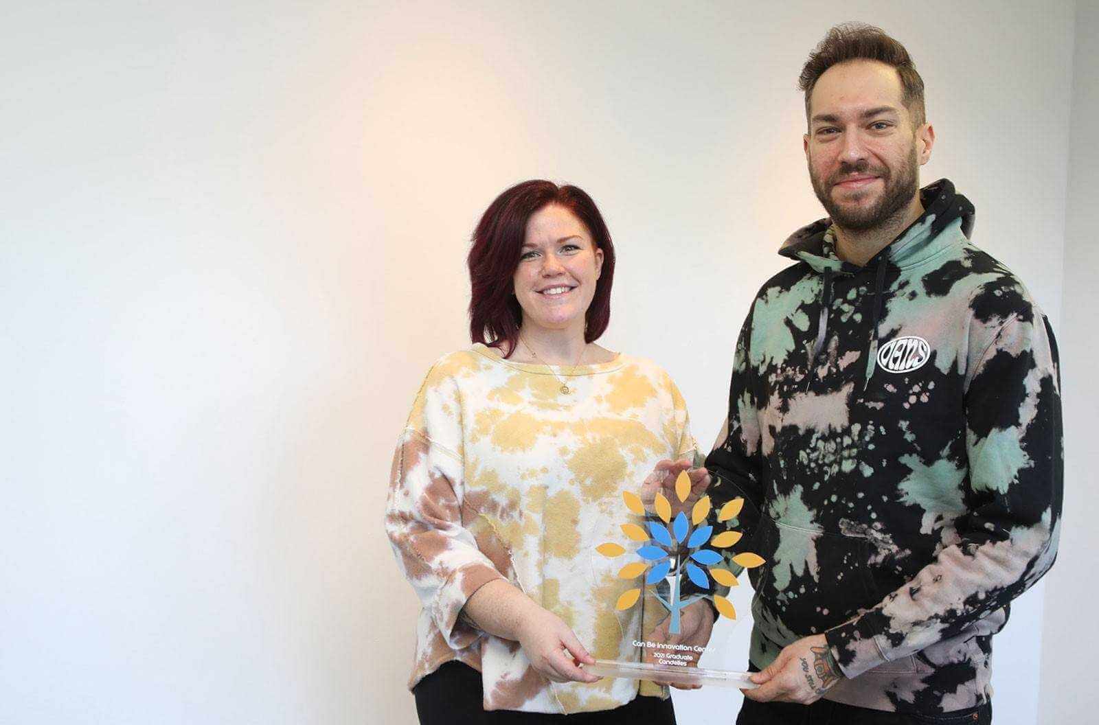 Candelles, a handmade soy candle company, is set to graduate from its space within the CAN BE Innovation Center in March and expand to a 6,800 square-foot facility in the CAN DO Corporate Center just a little over three years after it entered the regional small business incubator. Pictured here are, from the left, Candelles founders Kelley Major and C.J. Graaf.