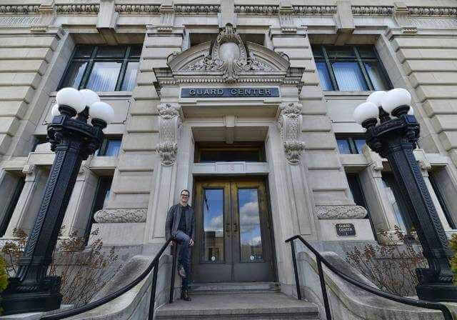 Kris Jones stands outside of a South River Street building formerly owned by GUARD. Local entrepreneur Jones has acquired this and a second building in which he hopes to promote ‘high-growth' businesses. - Aimee Dilger | Times Leader