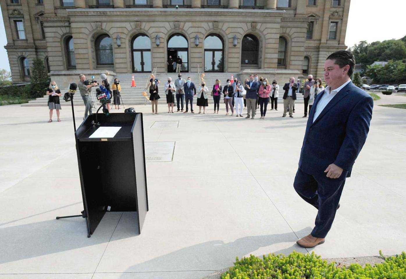 John Augustine walks to the podium at Tuesdays Press Conference on the Luzerne County Courthouse lawn. - Mark Moran, Citizens Voice