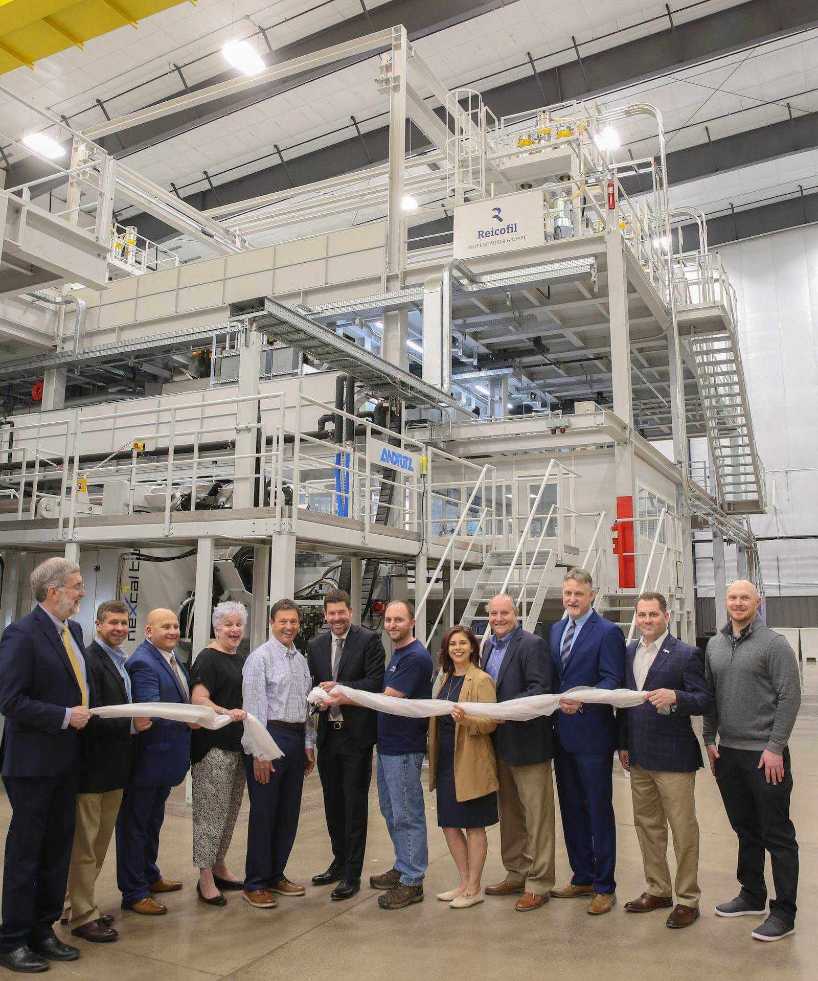 PFN held a formal inauguration and grand opening of their new manufacturing Line 9 in Hazleton. Pictured are, from left: Mark Jaros, Chief Investment and Operations Officer - PFN; Chris Scuron, General Manager - PFN; Bill Richards, District Director, PA Senate - Yudichak's Office - PA's 14th District; Mary Malone, Greater Hazleton Chamber of Commerce President; Tom Gerhard, Deputy District Director; Dir. Of Community Devel.; Rep. Dan Meuser | PA-09; Cedric Ballay, CEO - PFN; Jason Hess, Process Engineer on Line 9 - PFN; Jocelyn Sterenchock, Director of Economic Development - CAN DO; George Hayden, Hayden Power Group; Greg Kurtz, Director of Operations, CAN DO; Mike Karcutskie - President - Quandel Construction Group; and Kevin McClafferty, Line 9 Manager - PFN.