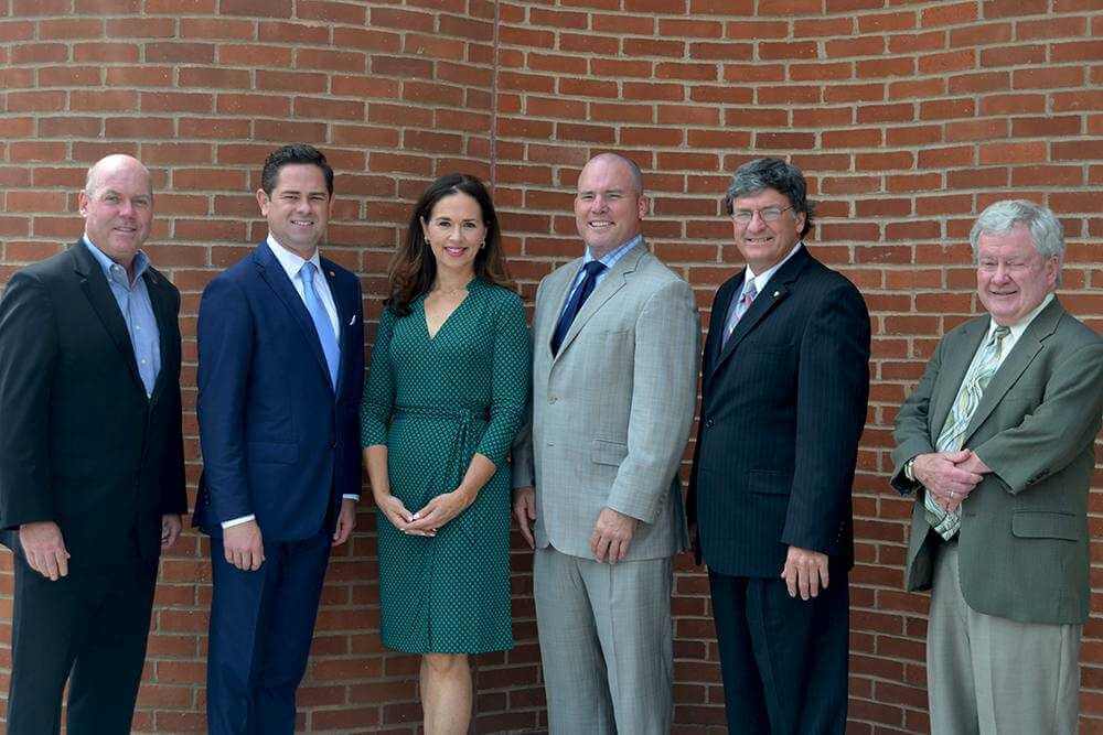 From left to right: Bob Durkin, president, The Greater Scranton Chamber of Commerce; Rep. Kyle Mullins, Rep. Bridget M. Kosierowski, Senator Marty Flynn, Rep. Mike Carroll, and P. Timothy Kelly, Esq., Needle Law, attend a meeting and luncheon at the Chamber.