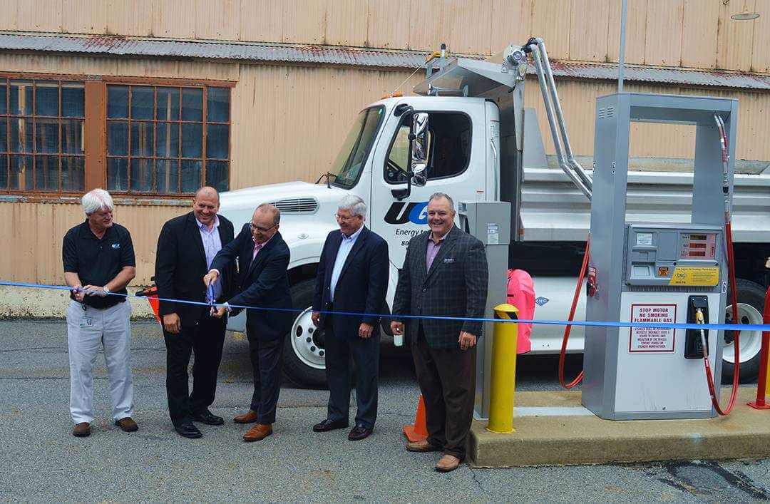 UGI representatives Tom Bates, Don Brominski, Bob Stoyko, Bruce Davis and Joe Bauman cut the ceremonial ribbon at UGI's new CNG fueling station.