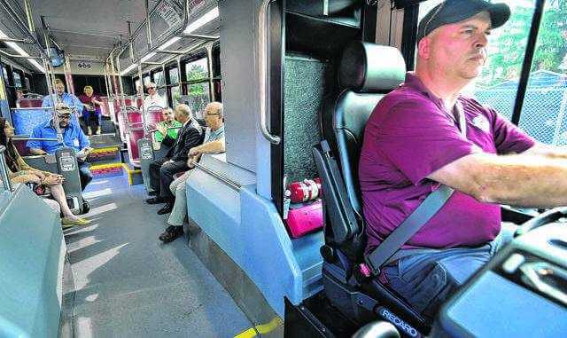 Luzerne County Transportation Authority operator Kevin McGee drives one of the agency's new CNG buses during a tour during the fall. LCTA and other area agencies have been praised by a national mobility organization for their efforts to promote transit and walkability in Luzerne County. - Times Leader file